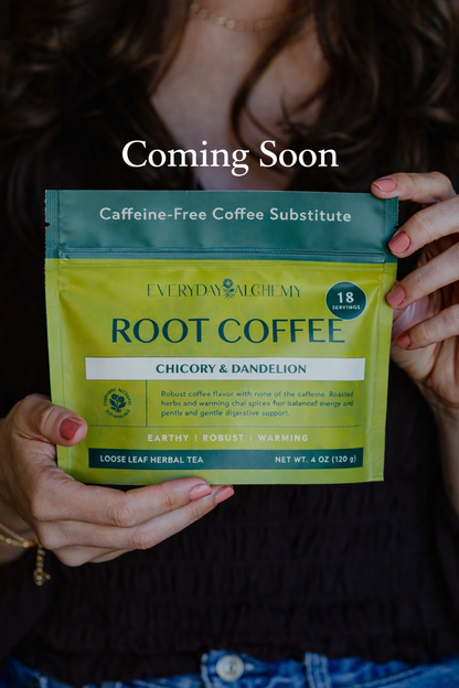 Person holding a package of 'Everyday Healthy' Root Coffee with text 'Coming Soon' above.